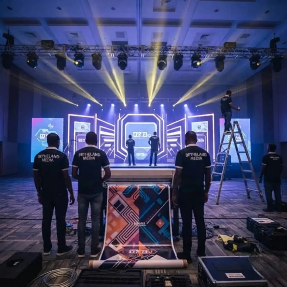 Bethadel crew preparing a custom stage set with intelligent lighting